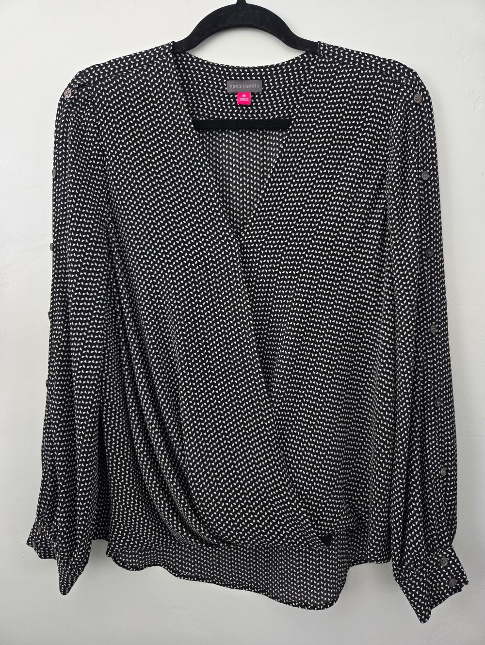 Vince Camuto blouse is a classic surplice faux-wrap top. Size Medium.